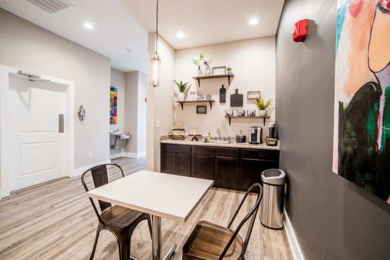 coffee room with a small set of table and chairs